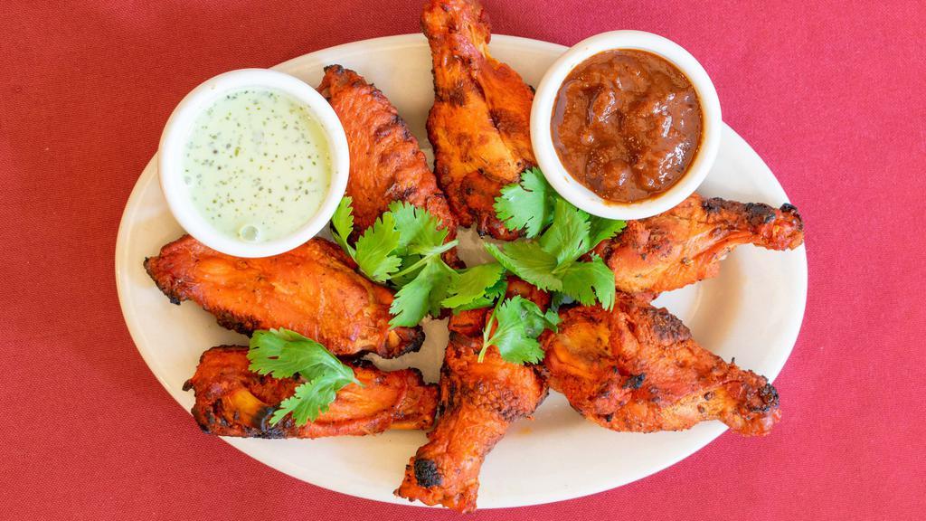 Tandoori Chicken Wings · Six pieces. Bone-in chicken, grilled to perfection.