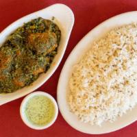 Lamb Saag · Boneless chunks of lamb in a delicately spiced spinach sauce, comes with rice