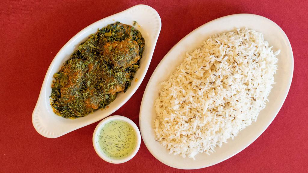 Lamb Saag · Boneless chunks of lamb in a delicately spiced spinach sauce, comes with rice