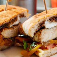 Burrata Chicken · Grilled chicken cutlet, sliced tomatoes, roasted peppers, burrata cheese, fresh basil, and b...