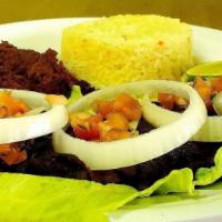Mojarra / Tilapia · Con arroz y ensalada o papas. / Includes rice and salad or fries
