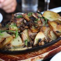 Mushroom & Potatoes · Fried potatoes with caramelized onions, garlic, oyster and button mushrooms, garnished with ...
