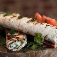 Chicken Wrap By Maya · Organic chicken with rice, tarragon, scallions, dill wrapped in Georgian flat lavash bread, ...