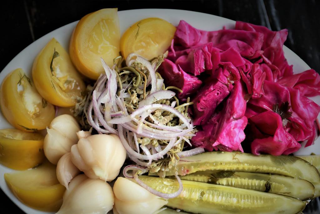Pickle Assortment · Vegan, gluten free. Cucumber, tomatoes, garlic, jonjoli (capers), red cabbage. (Keto-friendly).
