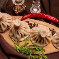 Khinkali · Oversized hand-rolled juicy dumplings, filled with seasoned organic meat and herbs. (Not you...
