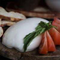 Fresh Sulguni · Made to order sulguni, served with Georgian bread and tomatoes.