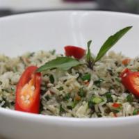 Thai Basil Fried Rice · Stir fried rice with bell peppers and garnished with fresh basil.