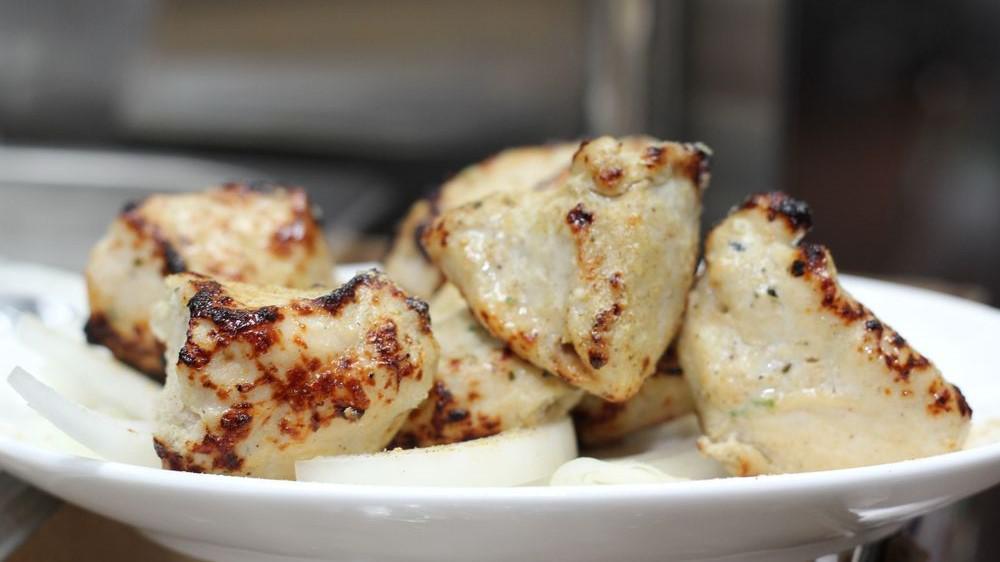 Chicken Malai Tikka · Boneless chicken pieces marinated in spices and cream and then cooked in a tandoor.
