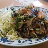 Yum Woonsen (Glass Noodle Salad) · Exotic glass noodle, chopped chicken, and shrimp stirred in a sweet lime sauce.