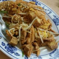 Pad Thai · Prepared mild, medium, hot, or Thai hot. Thai rice noodles stir fried in our homemade sauce ...