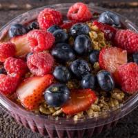 Berry Passion Acai Bowl · Strawberries, raspberries, blueberries, almond milk, organic raw agave & granola.