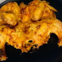 Chicken Tabaka · Fried chicken with spices.