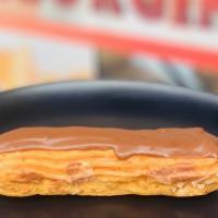 Eclair · Homemade eclair, crisp pastry made with choux dough filled with a cream and topped with choc...