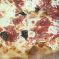 Pizza Margherita Pie · Traditional Neapolitan pizza with homemade Mozzarella, fresh tomato basil sauce and a touch ...
