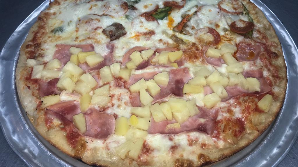 Hawaiian Pizza Pie · Pineapple and ham over a traditional neopolitan pizza.