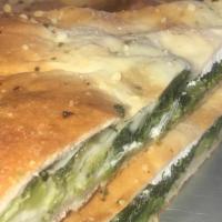 Stuffed Broccoli And Spinach Pie · Sauteed broccoli and spinach with a touch of whole milk ricotta and Mozzarella between two t...