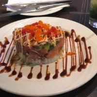 Sushi Tower · Tuna, salmon, yellowtail, cucumber, crunch, massago, avocado, with spicy tuna.