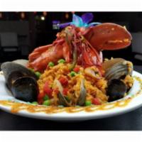 Classic Dc Seafood Paella · Dishes made or prepped with pork. With snow crab, Shrimp, Clams, Mussels, Calamari, Chicken,...