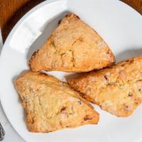 Scones · Available in multiple varieties, such as blueberry and cranberry orange.