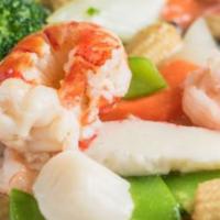 Seafood Delight · Lobster meat, shrimp, scallop, squid, crab meat a selection of vegetable mixed together with...