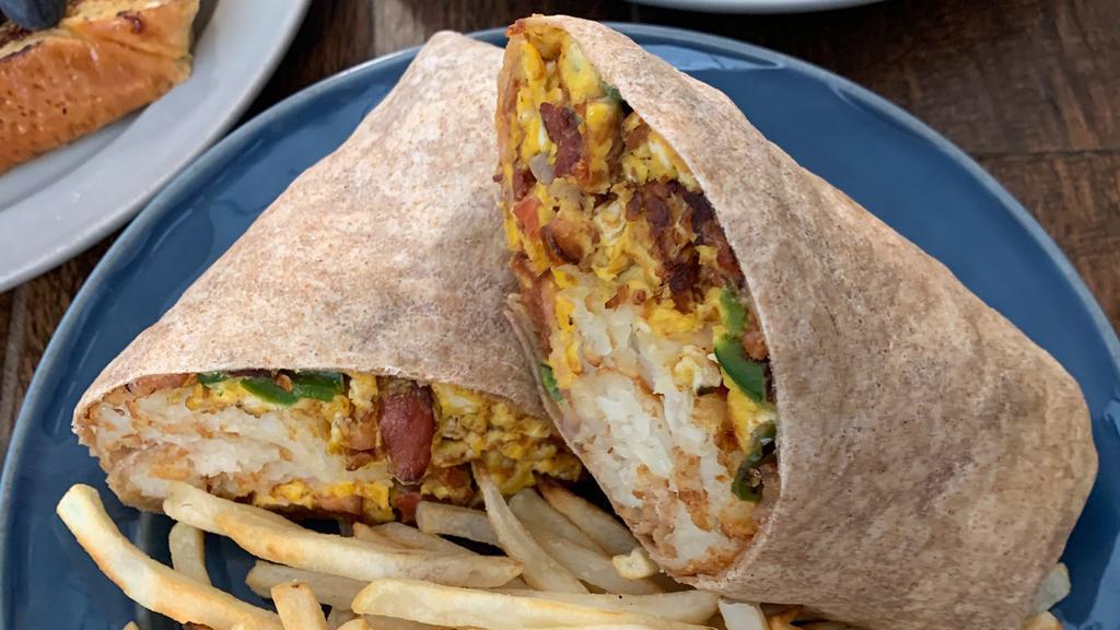 Nick'S Breakfast Burrito  · A massive Burrito with Grilled Pork Chorizo, Grilled Onions, Mozzarella Cheese, Green Chili Pepper, Sour Cream,  Scrambled Eggs,  Hash Browns, Cilantro , and  Bacon. Served on a warmed flour tortilla. 
Served with Organic Creamy Tomato Soup, Salad, or Air-Fried French Fries.