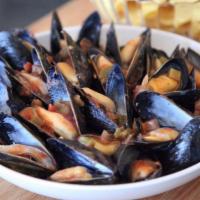 Pei Mussels · Carrot-ginger broth.