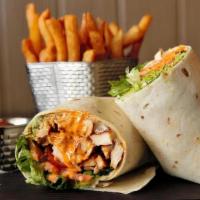 Chipotle Chicken Wrap · Grilled chicken, Romaine, tomatoes, Provolone, chipotle mayo, and avocado. Choice of white o...