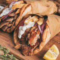 Original Greek Gyro! · Beef or chicken on a pita bread with lettuce, tomatoes, onions and tzatziki sauce