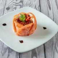 Caprese Mozzarella · Fresh Mozzarella, beefsteak tomatoes, roasted red peppers, arugula, and a basil pine nut pesto