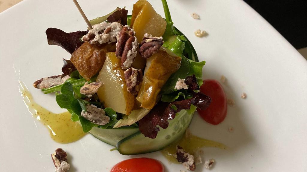 Pear & Mesclun Green Salad · Served with candied pecans, soft herbs, and in sherry emulsion.