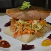 Pan Roasted Skin-On North Atlantic Salmon · Served with hearts of palm, citrus segment, shaved brussels sprouts, carrots, fennel, and to...