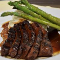 Grilled Flat Iron Steak Teriyaki · Served with whipped potatoes and asparagus