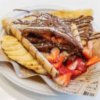 Classic Crêpe · Filled with strawberries, bananas and drizzled with nutella.