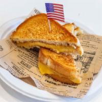 Sandwiches · Classic Grilled Cheese Sandwiches! American Cheese Grilled on sliced Sourdough Bread! Mmm......