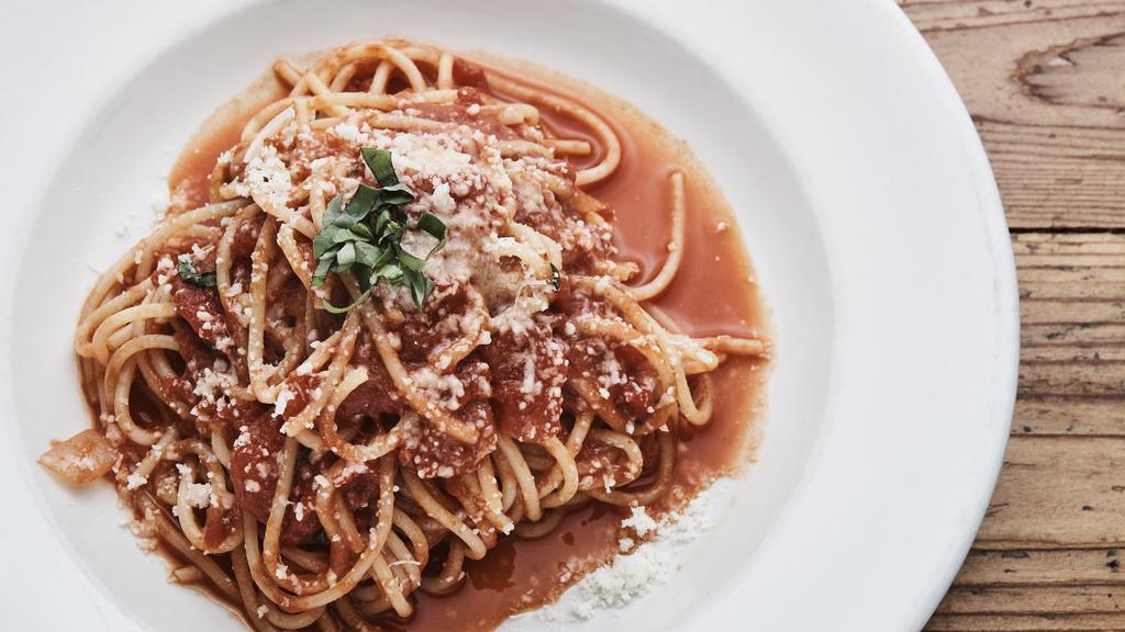 Spaghetti Pomodoro · San Marzano tomato sauce, basil, and parmigiano.
