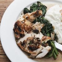 Wood Fire Free Range Chicken · Broccoli rabe with olives and mashed potatoes.