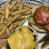 Cheeseburger Deluxe · Comes with choice a cheese. Served with lettuce, tomato, coleslaw and pickle with your choic...
