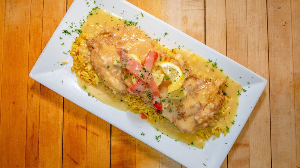 Chicken Francaise · Served over angel hair pasta.