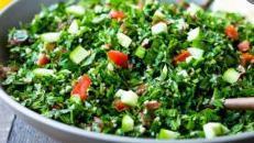 Tabouli · Chopped parsely tomato, green onion, whole wheat burgal, mint, olive oil, and our seasoning.