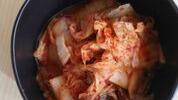Kimchee · Spicy Korean fermented napa cabbage seasoned with red pepper, garlic and ginger.