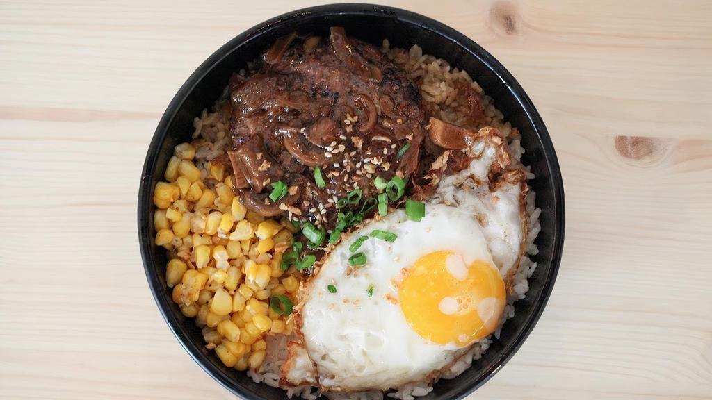 Loco Moco · Hawai’i Big Island style: 2 grilled beef patties topped with fried eggs, caramelized onions, covered in a homemade mushroom gravy.. A local island favorite!