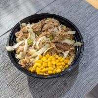 Kalua Pig · Traditional Hawaiian slow oven-roasted smoky pork served with cabbage.