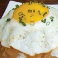 Loco Moco · Choice of Wagyu Beef Patty or Kalua Pig, Three Eggs Your Way, Grilled Onions & Brown Gravy O...