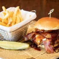 Western Wagyu Burger · Half Pound Wagyu Beef Patty with Jack Cheese, Onion Rings, Gourmet Bacon & BBQ Sauce On A Br...