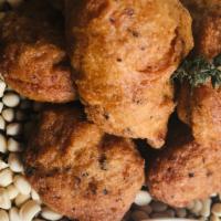 Accara (Vg, Gf) · Ghanaian black-eyed peas fritters with spicy
tomato onion lemon zest ( GF,VG)