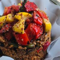 Djolof Stir Fried Rice (Vg, Gf) · Famous western African broken rice cooked in earthy spicy tomato sauce with roasted vegetabl...
