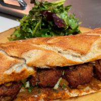 Senegalese Street Sandwich (Vg) · Black eyed peas fritters, habenero onion tomato relish on vegan baguette with salad