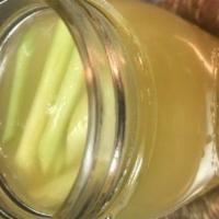Ginger Lemongrass Juice · fresh ginger juice , pineapple juice, infused with lemongrass sweetened with cane sugar
