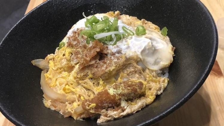 Katsu Don Bowl · Served with berkshire pork cutlet with egg over rice.