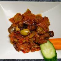 Eggplant With Sauce · Small pieces of pan fried eggplant topped with sauce made with fresh tomatoes, green pepper ...